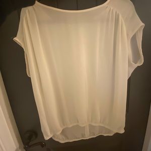 Size Medium cream blouse from Anthropologie.